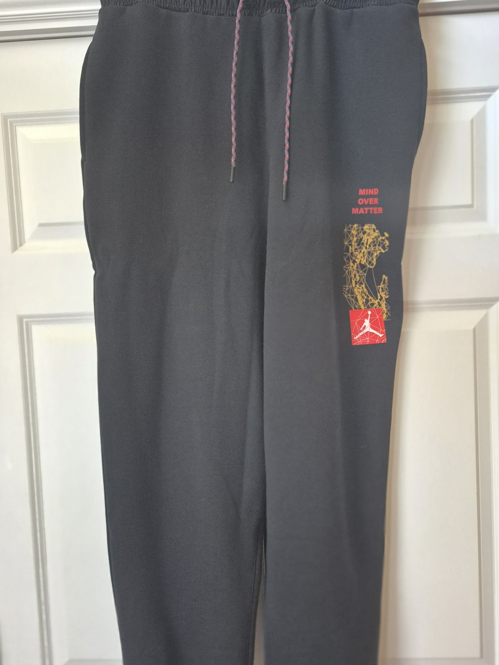 Jordan Black Sweatpants with Red and Gold Graphic